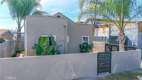 Photo of 1712 E 57th St, Los Angeles, CA 90058 (MLS # DW26089058)