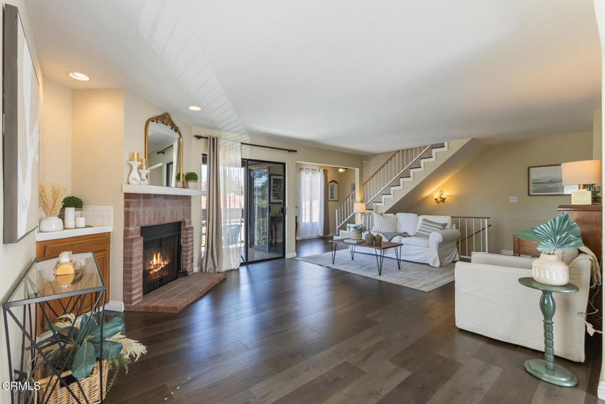 Welcome to this updated townhouse that perfectly balances modern comfort and everyday convenience. Featuring a spacious 2-car attached garage, this inviting home offers an ideal layout for both relaxing and entertaining. The bright and airy living room, complete with a cozy fireplace and adjoining dining area, creates a warm and welcoming atmosphere. The updated kitchenette is equipped with stainless steel appliances, generous counter space, and ample cabinetry. Multiple balconies extend your living space outdoors, offering ideal spots for morning coffee or al fresco dining.Upstairs, discover three well-appointed bedrooms, including a primary suite featuring a walk-in closet and a private bath. Two additional bedrooms and a full bath provide comfort and versatility for family or guests. Perfectly situated just moments from Whole Foods, The Americana at Brand, local shops and popular restaurants; and only steps from Wilson Middle School, this townhome offers the best of convenience in a five-unit community.