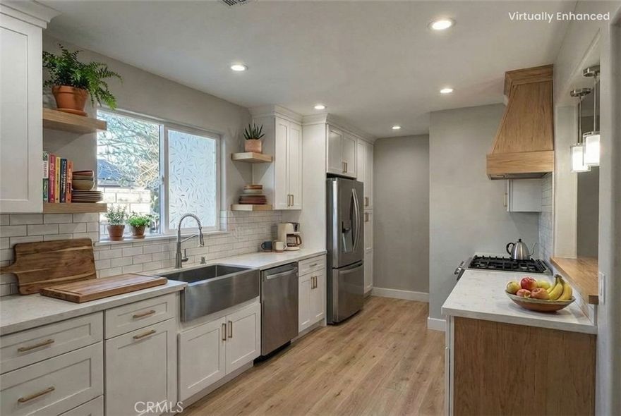 Welcome to 7101 Fallbrook Ave — currently undergoing a full top-to-bottom remodel and will be ready soon. This home is receiving a complete makeover, including brand-new flooring throughout, a fully updated kitchen, beautifully renovated bathrooms, fresh interior paint, and modern finishes for a clean, move-in-ready feel.
The property is being offered as a 3-bedroom, 2-bathroom home, *with the option to lease as a 4-bedroom, 3-bathroom for a different price*, offering flexibility for a variety of living needs.
Enjoy an open layout filled with natural light, a spacious front yard, private outdoor space, and convenient driveway parking. The entrance is not from the main street, providing added privacy and easy access.
Located in an amazing West Hills neighborhood, just minutes from shopping centers, dining, and close to the Israeli community, this home offers both comfort and an unbeatable location.
A rare opportunity to lease a fully remodeled home in a prime area—coming soon and worth the wait. Photos AI generated.