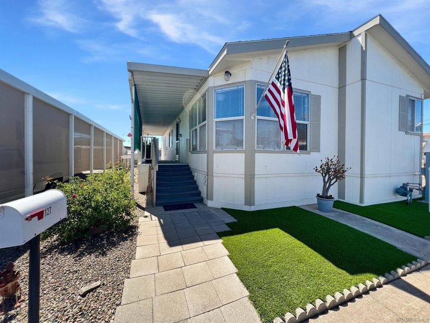 Welcome to Rancho Mesa, a gated 55+ senior community offering resort-style amenities and vibrant living! This well-maintained 3 bed, 2 bath home boasts 1,246 sq ft with vaulted ceilings, wood flooring, and abundant natural light. The kitchen features tile floors, stainless steel appliances, and gas cooking. Enjoy year-round comfort with central A/C, forced air heat, and a new A/C condenser. Outside, features include a covered porch, and covered carport. Located on a corner lot near the back of the community makes for peaceful living! Community highlights include a pool, clubhouse, fire pit, BBQ area, shuffleboard, gym, library, and social events. Conveniently located near the 67, 52, and I-8 freeways with shopping and dining nearby. Land lease is $1,635/month. One of the most affordable 3-bedroom homes in all of San Diego County — move-in ready and waiting for you!