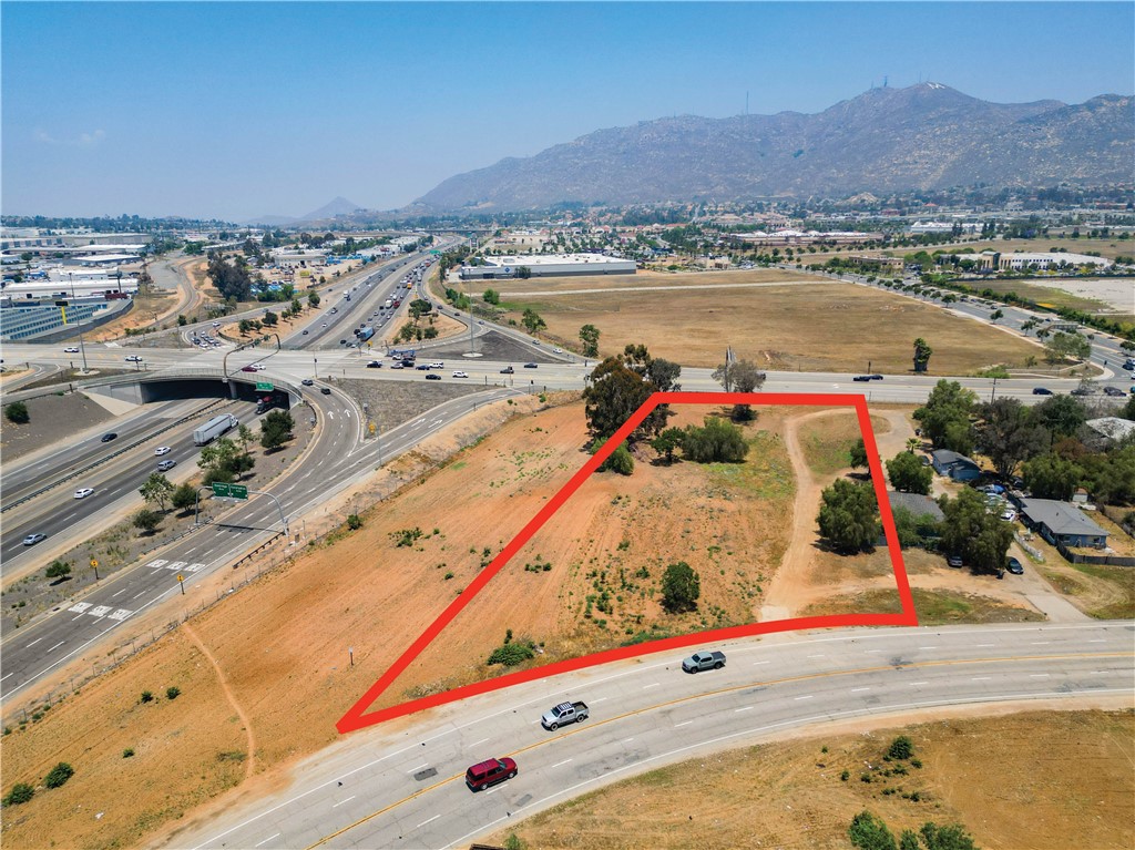 This ±1.54 acre site is one of the last vacant land parcels that has not already sold in recent years. Opportunistic in that it is located just east of the 215 freeway on/off-ramp to the heavily traveled Eucalyptus Avenue corridor. Immediately north of the site is the Canyon Spring Master Plan, a multi-year phased development of medical office, retail, hotels and a hospital. The site is also within a 2-to-3 block radius from major retailers such as Costco, Walmart, Sam’s Club, Winco as well as larger institutional quality apartment complexes built in the past two decades. The zoning is Community Commercial (CC) which allows for a wide range of potential uses from retail, office, medical, auto and much more. Buyer to verify the permit
process for desired use as needed.