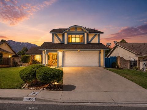Photo of 12356 Thistle Drive, Rancho Cucamonga, CA 91739 (MLS # IV26101268)