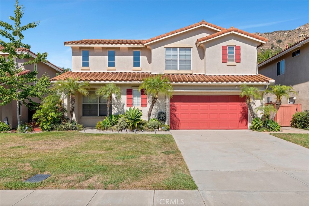 Welcome to this thoughtfully designed home, nestled in the established community of Lake Rancho Viejo. From the moment you arrive, you’ll feel a sense of peace and tranquility — set on a quiet cul-de-sac surrounded by rolling hills and a true neighborhood feel. The flexible floor plan offers space for every stage of life, including a rare and highly sought-after first-floor bedroom and full bathroom, ideal for guests, multigenerational living, or a private home office. The second floor encompasses the spacious primary bedroom suit with large walk-in closet and two secondary bedrooms share a Jack & Jill bathroom. The formal living and dining rooms create a welcoming setting for gatherings, while the family room, complete with a cozy fireplace, invites you to unwind and connect. Soaring ceilings and expansive windows bathe the home in natural light, enhancing the open, airy atmosphere. Step outside and enjoy the views and serenity of your surroundings. Enjoy the charm and connection of your community with local events, nearby wineries, walking and hiking trails, and the ambiance of downtown Fallbrook. Conveniently located near Hwy 76 and I-15, enjoy nearby Oceanside, Camp Pendleton, Old Town Temecula, Temecula Wine Country, San Diego, and more! You’ll also appreciate being in the Bonsall School District, low HOA, and no mello roos. Whether you're looking for comfort, convenience, or a sense of community, this home offers it all — and more. Discover the lifestyle you've been searching for at 3450 Lake Park Ave.