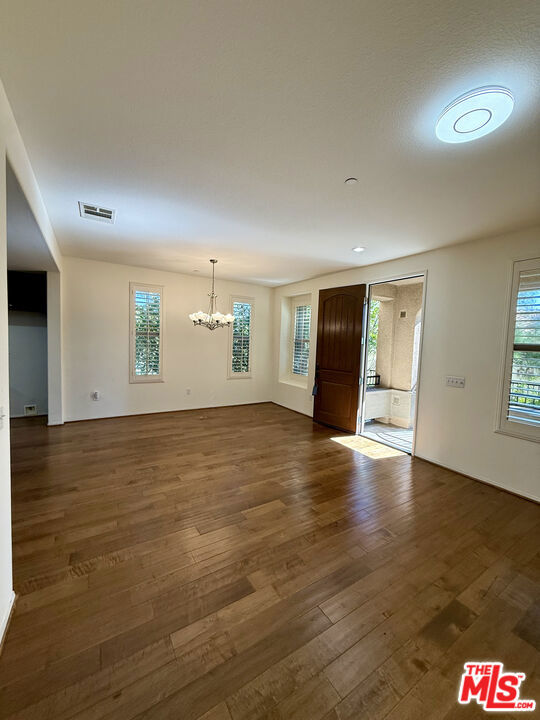 Step into resort-style living within the secure, gated Aldea community, fully guarded for your peace of mind. This impeccably maintained, two-story, 1,375 sq ft townhome offers: 2 Bedrooms & 2.5 Baths, Two-Story Floor Plan with bright, open living spaces, Gourmet Kitchen with granite countertops, stainless-steel appliances, and generous cabinetry, Warm, Durable Flooring: Wood-look laminate downstairs; plush carpeting in the bedrooms, Luxurious Primary Suite featuring a large walk-in closet and a dual-vanity en-suite bath, Convenient In-Unit Laundry Room, Private 2-Car Garage with direct access, Top-Rated Schools: Zoned for Porter Ranch's highly acclaimed elementary and middle schools, and Easy Freeway Access: Minutes to the 118 Freeway for seamless commuting. Aldea's lush grounds invite you to unwind by the sparkling pool and spa, let the kids roam on the playground, or host friends at the BBQ pavilion. Located adjacent to Porter Ranch Town Center, you're moments away from Whole Foods, boutique shopping, premier dining, and entertainment. Everything you need, right at your doorstep. Don't miss this opportunity to experience the best of Porter Ranch living!