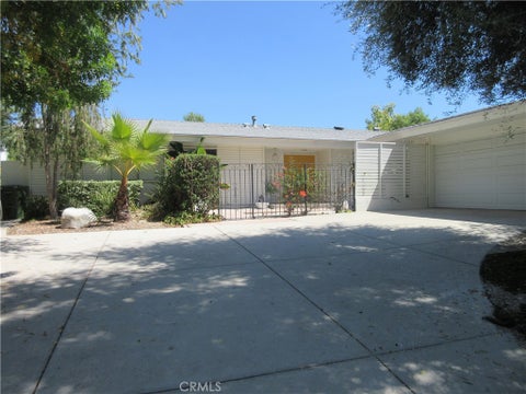 Photo of 24300 Hatteras Street, Woodland Hills, CA 91367 (MLS # SR26219297)