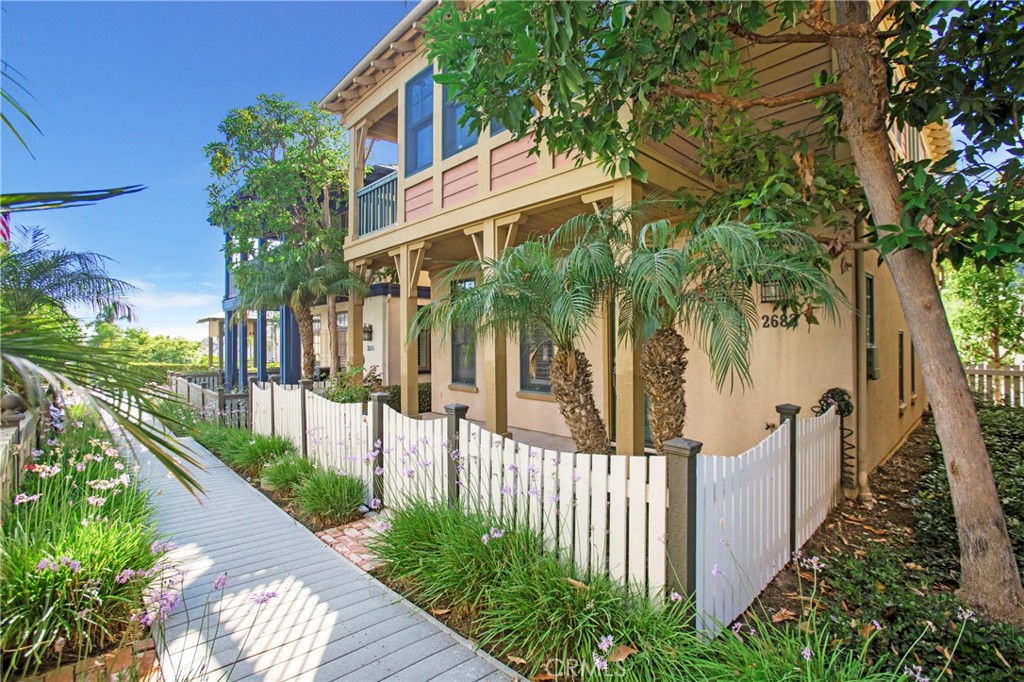 Below-market in Newport Beach. Read that twice. This fully updated 3-bedroom, 2.5-bath at Bungalow Place delivers the rare mix of luxury, location, and lifestyle that rarely comes available. From your front door you can walk to Corona del Mar Plaza for fine dining and boutique shopping, grab your morning coffee at Peet’s, pick up gourmet provisions at Bristol Farms, or settle in at Gulfstream for dinner—all without starting your car. Fashion Island, Sherman Library & Gardens, the Newport Beach Public Library, and Corona del Mar beach are all just minutes away. Inside, the home balances comfort and sophistication with a light-filled living room and fireplace, an open chef’s kitchen with stainless steel appliances and ample storage, and a patio designed for al fresco dining. Upstairs, the vaulted primary suite offers French doors to a private balcony, and a spa-quality bath and generous closet, with two additional bedrooms that flex easily for guests, office, or family. A two-car garage, and guest parking, complete the package. Homes of this caliber—at this price—do not sit. If you wait until next weekend, you’ll be watching someone else move in.