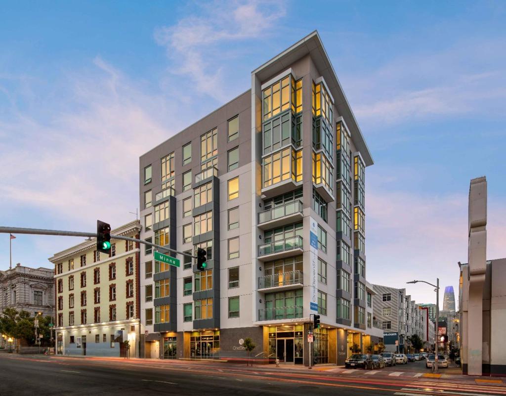 Discover the charm of this stylish 1-bedroom, 1-bathroom home in the heart of San Franciscos vibrant SoMa neighborhood. With Muni and BART right at your doorstep and downtown just a short stroll away, convenience is at your fingertips. Spanning 696 sq ft, this residence offers a thoughtfully designed living space. The kitchen is a dream for any home chef, boasting granite countertops and customized cabinets. The open-concept dining area seamlessly connects to the living room, making it perfect for entertaining. A blend of Oak flooring and carpet flooring add to the homes sophisticated ambiance. The inviting living room provides a cozy retreat. Enjoy the ease of in-unit laundry. Located in the boutique OneEleven condo complex, residents enjoy access to an expansive rooftop with a BBQ island, and stunning city skyline views. Additional amenities include a secure package room, bike storage, and an exclusive resident lobby. Don't miss the chance to make this exceptional home yours!