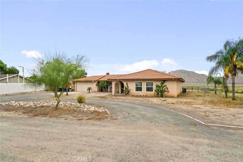 Photo of 29085 Envoy Dr, Nuevo, CA 92567 (MLS # IV25243888)