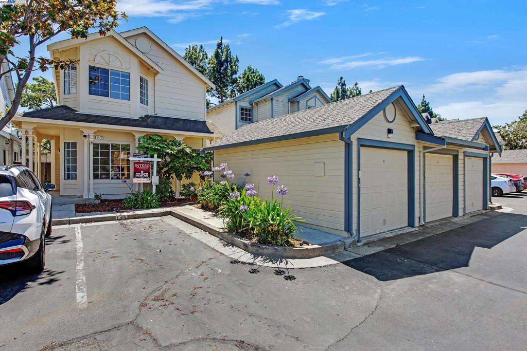 Gorgeous, move-in ready home with a bright, open layout! This is a 3 bed 2.5 bath about 1627 sqft hm with 1950 lot siz. New paint interior & exterior & including exterior of garage. Updated vanities in guest baths. Convenient downstairs bedroom perfect for guests or home office. Soaring ceilings, new lighting, wood-burning fireplace, and wrap-around patio create the perfect indoor-outdoor feel. Updated kitchen with granite counters, pantry with pull-outs, & breakfast nook with yard access. Spacious primary suite with high ceilings, walk-in closet, dual vanity, and stall shower. Upstairs guest suite with attached bath, plus upstairs laundry. Detached 1-car garage. Low HOA offers front yard maintenance |Trash | Pool| Playground Common area. Prime location near 880, Dumbarton Bridge | Costco, Pacific Commons shopping | dining | AMC theaters |24Hr Fitness & more!