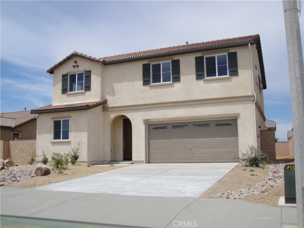 Embrace modern living in this 4-bed, 3-bath home located near Quartz Hill High School in Lancaster, CA. This home features 2196 sq, a versatile loft that can function as a 5th bedroom. With 9-foot ceilings, bright rooms, and a bedroom and bathroom on the main floor, the layout is both practical and welcoming. The master bedroom offers dual sinks, a large walk-in closet, and scenic community views. Enjoy an open floor plan connecting the kitchen to the spacious living room, complemented by a glass slide door, breakfast counter/bar, and upgraded kitchen features. This energy-efficient home includes a tank-less water heater, LED lights, and a low-flow plumbing system. Practical amenities include a two-car garage, large laundry room, and central air and heating control. With NO Mello Roos, Benefit from proximity to Quartz Hill High School and upcoming commercial projects. Experience modern comfort and convenience.