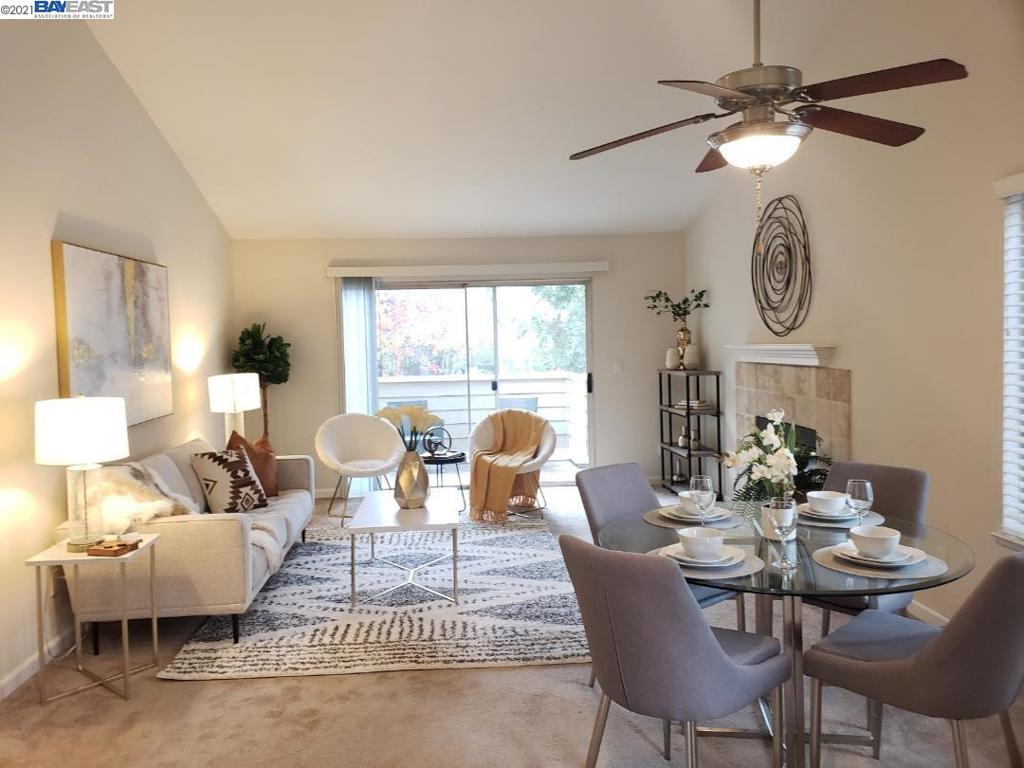 Don't miss this opportunity and location! Enjoy this beautiful upper-level end unit with vaulted ceilings. Spacious living area with cozy fireplace. Updated kitchen with stainless steel appliances and updated bathrooms. Large primary bedroom. Amenities include pool, hot tub, exercise facility, clubhouse and community BBQ area. One covered carport included and storage closet on balcony. This property is just steps away from great restaurants, shopping, movie theater, parks and entertainment. Enjoy the outdoors on the nearby Iron Horse Trail. Easy freeway access as well! Peaceful setting with beautifully landscaped grounds and fountains! This is resort living!