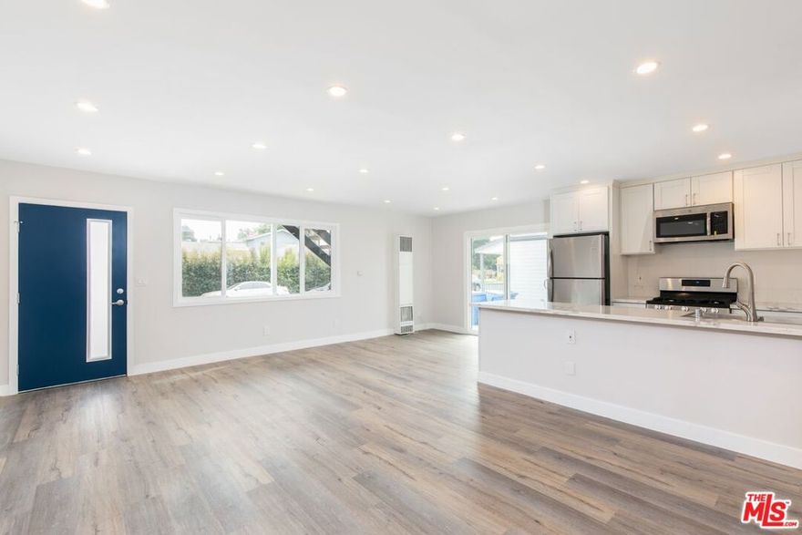 Greetings, you lucky Angeleno! Are you ready to have LA at your finger tips? Ready for that additional office space since you've been working from home all this time? Step in to this gorgeous lower apartment, and appreciate all the little details that went into making it so fabulous. Check out those gorge floors and bathroom with show-tub combo. Your beautiful kitchen comes with stainless steel dishwasher, fridge and stove plus beautiful marble-look quartz countertops. Enjoy double-paned windows throughout and an adorable blue front door, plus a sliding glass door that lets in air and light and leads to a shared patio space. Recessed lights and wall A/C in the bedrooms round out this pretty picture. You've got a bonus room/den/office space off the living room with large frosted glass sliding door (no closet), plus your traditional bedroom with closet. Work/life balance? You've got it now - just slide that office door shut and forget about it for the evening. Separation of space is the name of the game! Outside - plenty of room for your furry friend enjoy some California sunshine. You're on a quiet side street but just minutes from the action of Culver City. Shared laundry is steps from your door, shared with only 2 other units. One parking spot included (2nd spot may be avail for additional monthly fee). A maximum of 2 pets will be considered with additional deposit, and water and gardener are covered by the owner. Smack dab in the middle of the Westside in Culver City, with easy 10 and 405 freeway access, plus close to the Metro Expo Line! Just minutes to the supermarkets, eateries and shopping of downtown Culver. The beach is about 15-20 minutes away too!