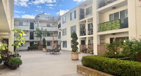 Photo of 12801 Moorpark #106, Studio City, CA 91604 (MLS # DW26015424)