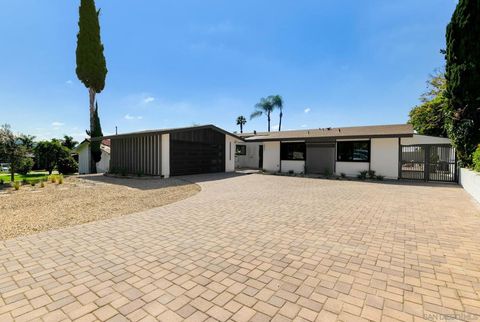 Photo of 6852 Jackson Dr Dr, San Diego, CA 92119 (MLS # 260004788SD)