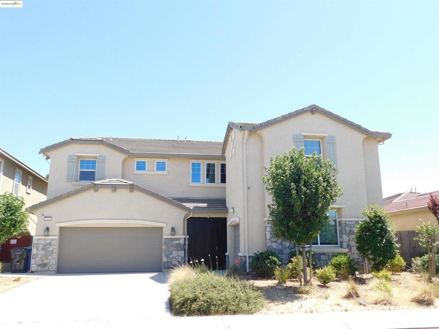 Stunning Modern Single-Family Home in Manteca Nestled on a quiet street in a safe and well-established neighborhood, this exceptional residence offers the perfect blend of comfort, space, and style. Built in 2017, this expansive 3,743 sq ft home features 5 bedrooms, 4.5 bathrooms, and a spacious 3-car garage. Designed with an open-concept layout, the home is filled with natural light and boasts both a formal living room and a generous family room. The gourmet kitchen is a chef’s dream, complete with upgraded granite tile countertops, a stylish glass tile backsplash, ample cabinetry, a large walk-in pantry, and an oversized center island—ideal for entertaining. The luxurious master suite includes a soaking tub, separate shower stall, dual vanities, and an expansive walk-in closet. The low-maintenance backyard features a large covered patio—perfect for hosting gatherings year-round—along with a bonus storage shed for added convenience. This home truly has it all. Don't miss the opportunity to make it yours.