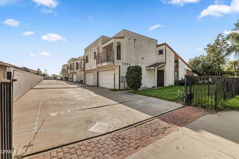 Photo of 11226 Elliott Avenue #E, El Monte, CA 91733 (MLS # P1-26346)