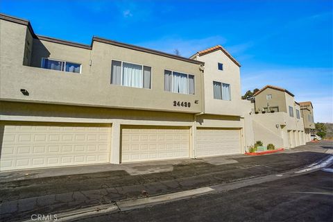 Photo of 24439 Leonard Tree Ln #102, Newhall, CA 91321 (MLS # SR25281785)