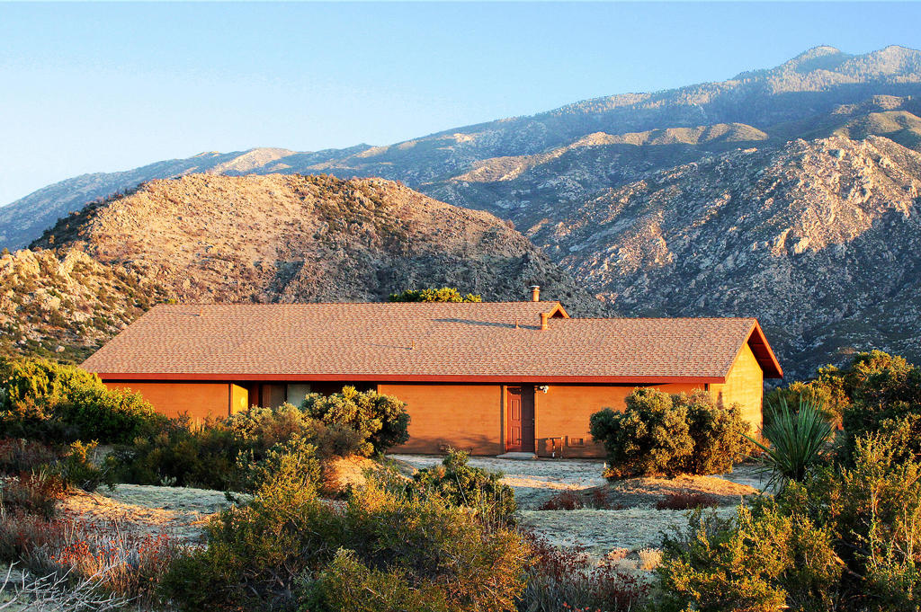 $5,000 REDUCTION! This is an opportunity to own in an upscale mountain community. A short 20 minute scenic drive from the desert floor brings you to the private community of Pinyon Crest. A different world awaits your arrival - one that is 10-20 cooler than the desert floor. This upscale community has its own community-owned wells providing fresh, clean water to all residents, graded roads, mailboxes and locking back gates for security and privacy. These essentials and the equipment used to maintain them are owned by the residents' HOA with a salaried resident operator/mechanic on duty. Now for technology: Anza Electric CoOp provides reliable power, hi-speed fibre optic internet and strong WiFi to the mountain communities. Desert getting too hot for you? Make this your new home office and work remotely with all the necessary essentials. This ranch style home is located on 1.03 acres with mountain views and room to create new outdoor living spaces that suit your needs. Inside, natural light streams through your windows into the bright, spacious primary bedroom and comfortable guest bedroom, separate large full bath, a well equipped kitchen, breakfast bar, washer/dryer, and spacious dining area. Delight in a multi-windowed open living room bathed in sunlight with wide open mountain views. This is a solid, practical home, a safe, self-sufficient enduring community with fresh mountain air, crystal clear starry nights that make you feel a part of the Milky Way, and quiet. Very quiet... Pinyon Crest is an official national monument, a wildlife habitat, and a designated Mount Palomar night viewing area. So come up, take a look; breathe the air and make an offer at this new reduced price! Welcome to your new home and peace of mind. Did I mention the panoramic mountain views from every angle and every window in your house. Step outside onto your front or back deck and feel the freedom of wide open skies and fresh mountain air. Wait, was that a hawk floating effortlessly on an updraft close enough to circle above, dip its wings and continue on the hunt. Wow. That's what I'm talking about. It's a beautiful life up here at one with the universe. A sanctuary within your reach, and amazingly within a 20 minute drive to the Desert Cities below. Think about it. But don't think too long. You're not the only one looking at this listing. Opportunity knocks... Now smile, and take your best friend out for a nice long walk.
