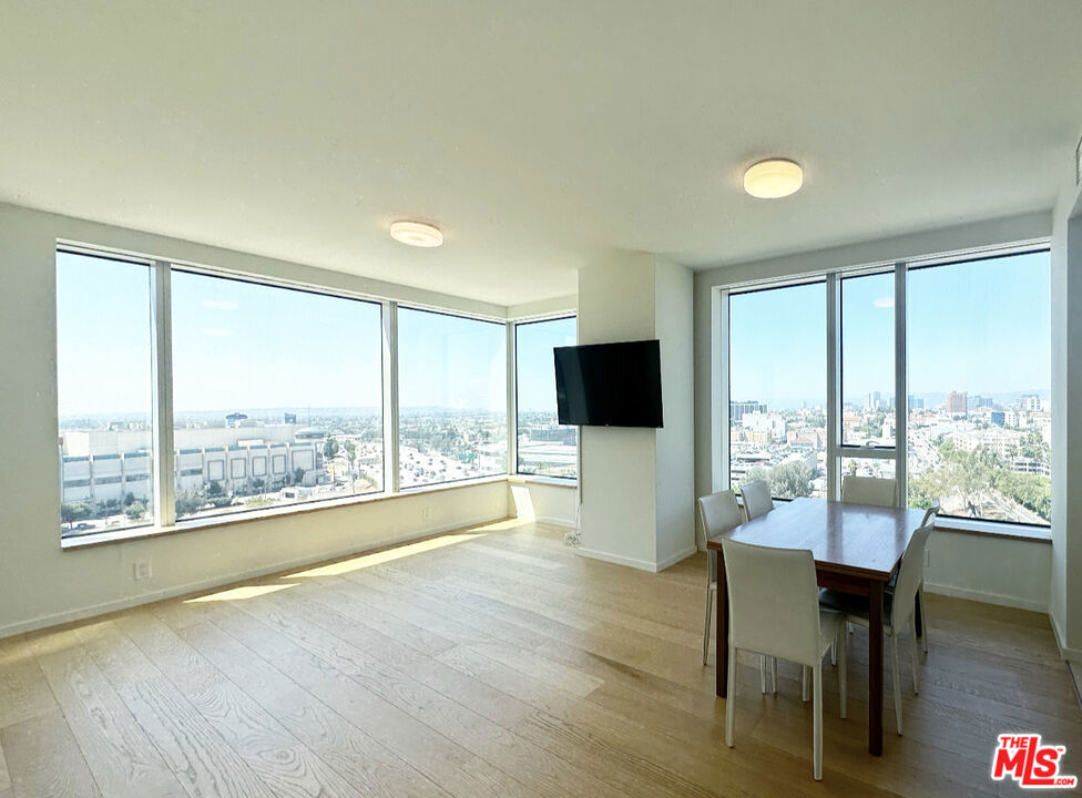 Welcome to Metropolis, one of the Luxurious High Rise Condominium in Downtown Los Angeles. This beautiful 2 Beds+Den, 2.5 Baths at Metropolis Tower 1 is available for immediate Move in. TV, 2 Computer Desks, 2 Computer Chairs, Dresser and Cabinets, 2 Bed frames ALL INCLUDED! **ALL UTILITIES are included ( Water, Trash, Gas, Wifi/Internet, and 2 Reserved Parking Spaces) *** The spacious corner unit comes with floor to ceiling windows all throughout and receives sufficient sunlight throughout the day where you can enjoy beautiful panoramic views of Downtown Los Angeles. Thoughtful attention has been paid to every detail from French Oak hardwood floors with modern sleek Bosch appliances, and elegant caesar stone countertops. All bedrooms include a walk-in closet and an en-suite bathroom. Unit comes with 2 Parking Spaces, and has Guest Parking & EV charging available on premises. The Metropolis Downtown offers residents 24/7 Security, guarded access, and a dedicated 24 hour concierge service. World-class amenities include fitness center, yoga/spinning studio, heated pool and jacuzzi, steam sauna, locker rooms, wellness garden, cabanas, dog park, billiard room, game room, theatre room, business center, BBQ area and a full kitchen catering room for you to entertain. Residents can also enjoy access membership dining & room discounts at Hotel Indigo. Metropolis is conveniently located near the Crypto.com Arena, L.A. Live, Los Angeles Convention Center, FIG at 7th shopping center and has easy access to the 110, 101, and 5 fwy.