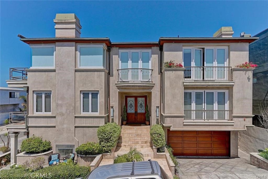 Spectacular Three Story Luxury Ocean-view Property with over 3,492 Sq. Ft. of Living Space. This highly upgraded 4 Bedroom (plus Office, Gym, or possible 5th Bedroom) / 3.5 Bath single family home is located in one of the most ideal locations in Manhattan Beach. Prime corner lot custom built in 2002. Easy access, walking distance to the Beach and Restaurants. The open gourmet kitchen with Subzero Refrigerator and Viking Stainless Steel includes a large kitchen island open to the family room with breathtaking picturesque ocean views. The entire top floor is an entertainer's dream with an ocean view deck, overlooking the family room, dining and living areas. The Primary Bedroom is sure to impress with a Fire Place, Ocean Views, a Private deck, and recently remodeled spa-style bath, and a large walk-in closet with New custom cabinetry. On the lowest level is an intimate 2nd Family Room / Bonus Room which includes a murphy bed. Lower level also features an extra Bedroom and Bath perfect for a guest or in-law. Laundry Room is also located on the lower level. Brand new carpet was installed 7/18/2025. Property also includes an Elevator that stops at all levels Starting from the Garage.