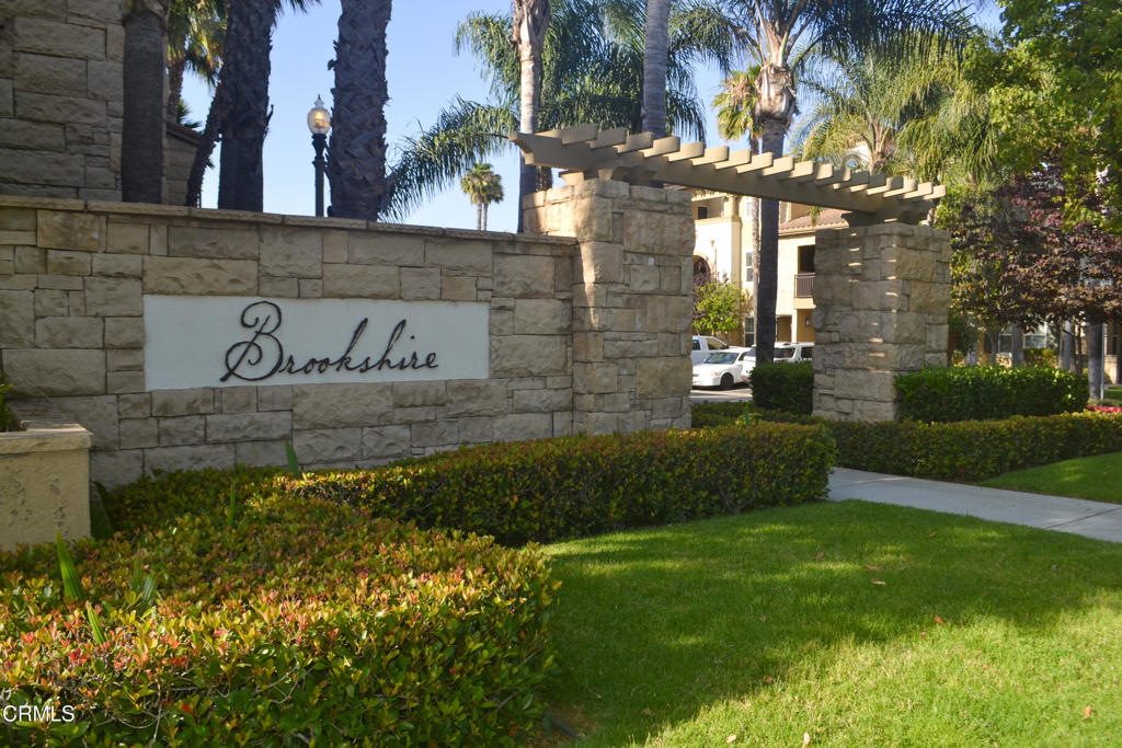 Welcome to your peaceful sanctuary at Brookshire at Village At The Park in Camarillo! With new carpet and fresh paint throughout, this beautiful 2-bedroom, 2-bathroom top-floor unit offers privacy, comfort, and sweeping views of open fields from every room --perfect for relaxed, modern living. With no upstairs neighbors and only one unit next door, you'll love the quiet and the refreshing breeze that flows through your bright, open living space. Enjoy the open-concept living and dining area with abundant natural light. Step onto your private balcony and enjoy morning coffee or golden hour sunsets with open skies and greenery in sight. The kitchen is complete with breakfast bar, stainless steel appliances, granite counters and ample cabinet space. Relax in a spacious primary bedroom featuring a walk-in closet, a large en-suite bathroom with double sinks, a tub with shower, and a linen closet - perfect for added comfort and convenience. The second bedroom, nearby full bath, and in-unit washer/dryer complete this unit. The dedicated parking includes a single garage with driveway. Brookshire includes a pool, spa, BBQ area, fitness room, and banquet room, Residents also have key access to the main park and facilities at Village At The Park and to the adjacent 55-acre sports park. Within Brookshire and just a close walk away are businesses and shops including a market, a cafe, a barbershop, salons, and many more. Brookshire is situated next to the YMCA with easy access to the 101 freeway, Camarillo Premium Outlets, schools and parks. Breathe easy with fresh air, beautiful views, and a peaceful atmosphere -- all from your own top-floor hideaway.