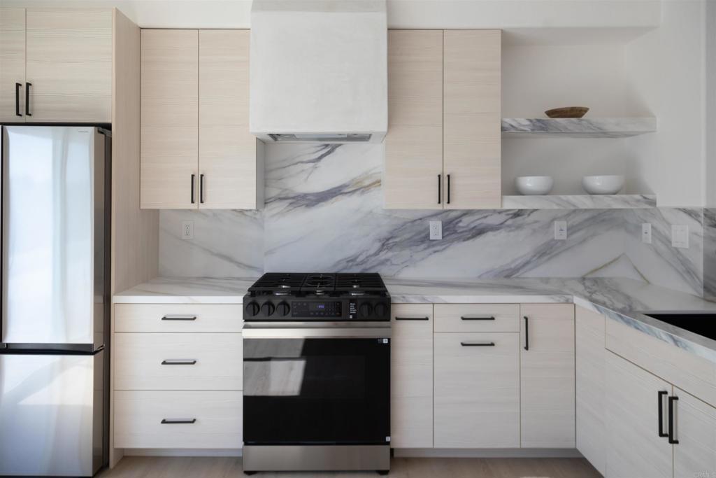 Beautifully Renovated 4-Bedroom Coastal Gem! Welcome to 183 Plumosa Street—perfectly located in the heart of Oceanside on a spacious 6,000 sq ft lot just minutes from the beach, shopping, dining, and freeways. This single-story home offers 4 bedrooms, 2 bathrooms, and 1,723 sq ft of beautifully updated living space. Recently renovated with high-end finishes, this home features a brand-new kitchen with stainless steel appliances, custom cabinetry, and sleek countertops. Both bathrooms have been fully refreshed with modern fixtures, and new flooring runs throughout the home. Fresh interior and exterior paint complete the transformation, creating a light, bright, and welcoming environment. The backyard offers ample room for entertaining, gardening, or simply relaxing in the coastal breeze. Enjoy added privacy with no neighbors behind—a rare find in this desirable location. Turnkey, move-in ready and waiting to become yours.