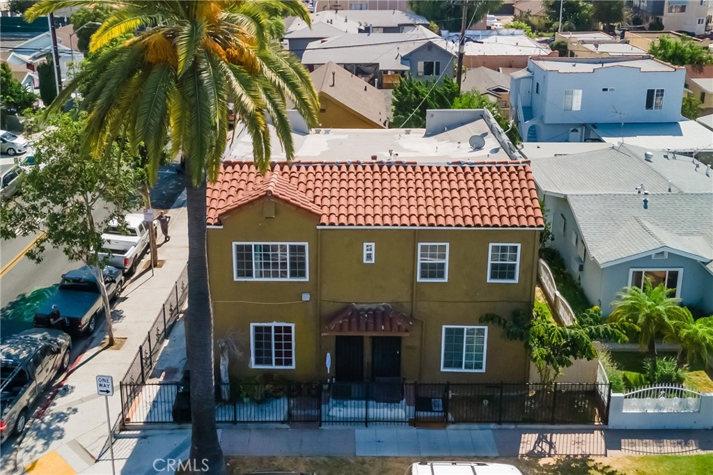 Rare Investment Opportunity in Huntington Park! This well-maintained 4-unit property offers excellent rental potential and a prime location. The large upstairs 2-bedroom unit features a formal dining room/den that could easily serve as a 3rd bedroom, perfect for increasing rental income. The remaining three units are spacious 1-bedrooms, providing consistent tenant demand. Additional features include three garages, a rear yard, and corner lot frontage at the southeast corner of Saturn Ave. and Templeton St. Addresses included: 2800 Saturn, 2806 Saturn, and 6904 Templeton. Situated in a thriving rental market, residents enjoy proximity to popular local amenities such as Salt Lake Park, Huntington Park Farmers Market, Pacific Boulevard shopping district, and easy access to DTLA, major freeways, and nearby dining and entertainment. An ideal property for seasoned investors or those looking to expand their portfolio.