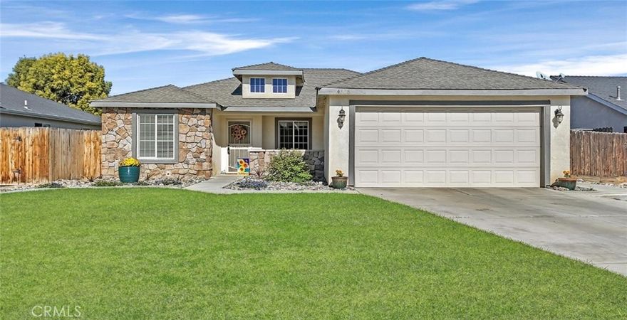 Take a look at this stunning home in the highly sought-after Stone Creek community, offering 3 bedrooms plus a den, 1.75 baths, and numerous updates throughout. The inviting living area provides ample space for entertaining and is filled with natural light. The kitchen features a newer dishwasher, well-maintained tile countertops, and a spacious dining area with backyard access. The den near the entry makes an ideal office or gym, while the bedrooms offer generous layouts and plush carpet. Both restrooms have been beautifully updated with modern countertops, and the master suite includes a stylish step-in shower. Step outside to a backyard oasis featuring custom concrete work, an elegant koi pond with a tranquil water feature, two lush grass sections, and a side yard large enough for an extra vehicle or trailer. Don't wait, schedule your private showing today!