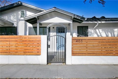 Photo of 401 Kendall Avenue, Los Angeles, CA 90042 (MLS # DW26010002)