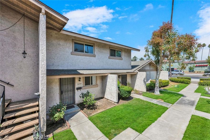 Charming townhome with new flooring on the upper level and recently painted throughout. Upgraded kitchen with granite countertops  Great features including nice grade level patio, 1 car garage with room in front of garage to park another full size vehicle. A walk score of 82 because of the proximity to a wide variety of stores, shops, and restaurants. Plus the elementary school is just two blocks away. HOA dues include some utilities