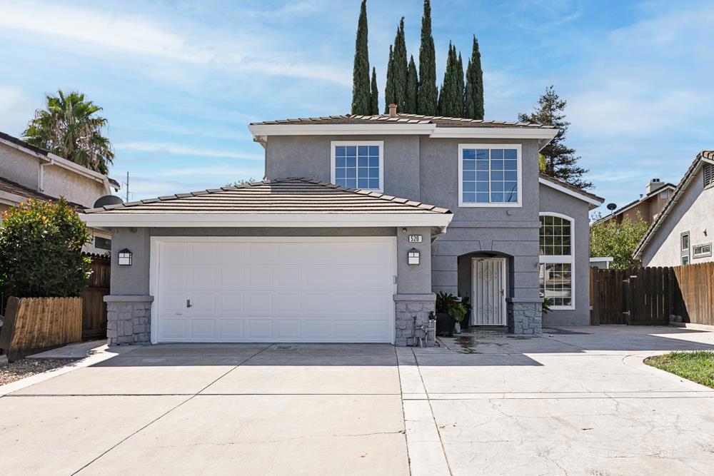 Welcome to this inviting 3-bedroom, 2.5-bath home located in the heart of Tracy. Featuring an open-concept kitchen with an oven range and perfectly sized refrigerator, the space flows seamlessly into the family room - ideal for daily living and entertaining. A formal dining area adds versatility for gatherings. Enjoy elegant flooring throughout, vaulted ceilings for added spaciousness, and a cozy living area perfect for relaxing evenings. Updated bathrooms offer double sinks and granite finishes. Additional highlights include central heating and cooling with ceiling fans, an attached 2-car garage with laundry area, and access to the highly regarded Tracy Joint Unified School District. Don't miss this opportunity to make this beautiful home yours!