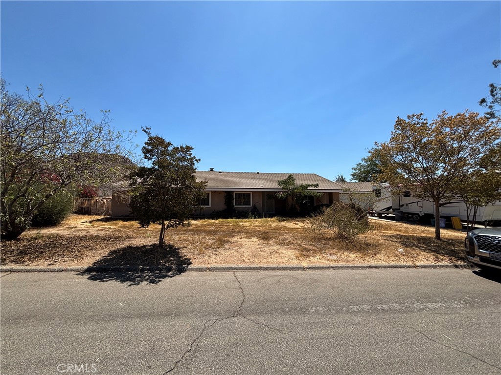Endless Potential on nearly 3/4 Acre!
Welcome to this spacious 4-bedroom. 2-bathroom house offering 2074 sq ft of living space on a sprawling 32,234 sq ft lot. Built in 1980, this property provides a solid foundation and the perfect opportunity to make it you own with a little updating and TLC.
The home features a functional floor plan with generously sized rooms, a study, a cozy family room with a rock fireplace and wooden ceiling. The kitchen has stainless steel appliances and granite counter tops.
Outside, you'll find a 40' X 60' barn, ideal for storage, workshop space, or even conversion into something more.
With such a large lot, the possibilities are endless-Don't miss out!! Professional photos coming soon.