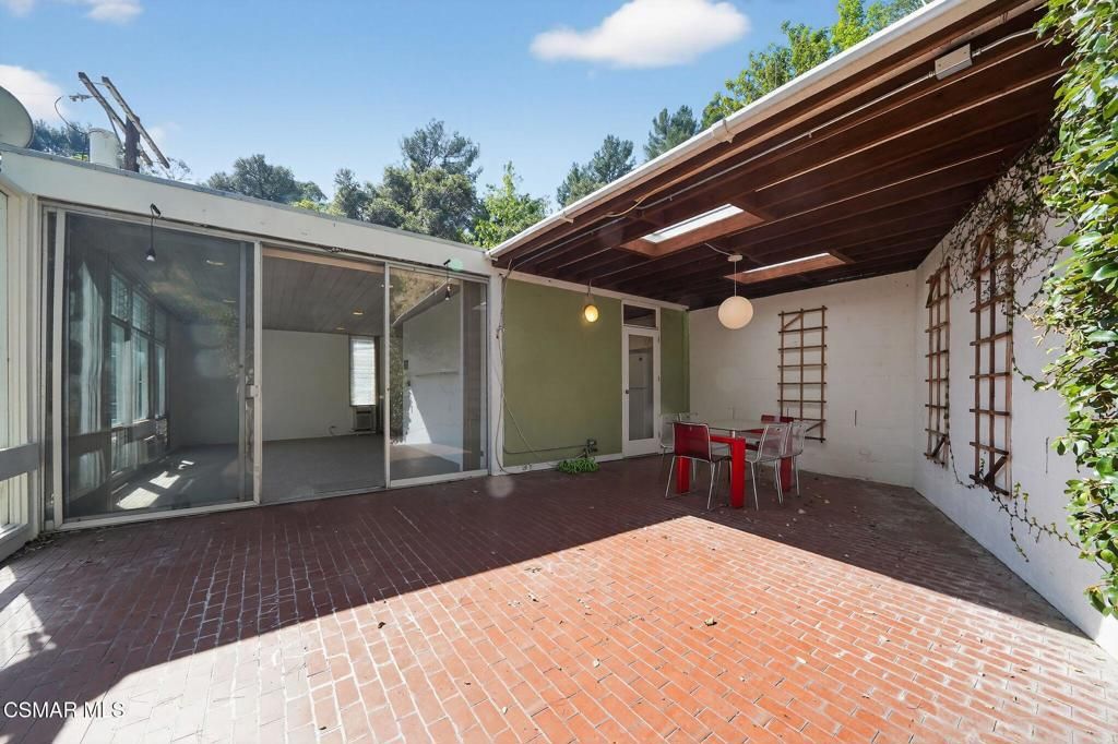 Photo of 10441 Oletha Lane, Los Angeles, CA 90077 (MLS # 226001210)