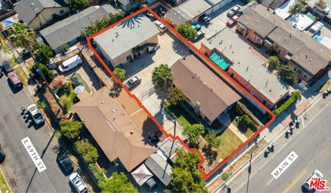 Photo of 6910 S Main Street, Los Angeles, CA 90003 (MLS # 26102135)