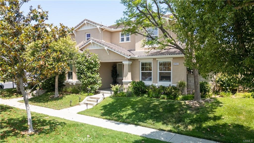 Welcome to this beautifully upgraded townhome in the prestigious guard-gated Promenade community of Porter Ranch— offering the perfect blend of privacy, style, and convenience. Ideally situated just steps from the sparkling community pool and spa, this elegant home is move-in ready and packed with high-end upgrades. Step inside to find an inviting open-concept layout with rich custom flooring, a striking dual-sided fireplace, and a stylish formal dining area perfect for entertaining. The chef-inspired kitchen features brand-new white quartz countertops, a spacious center island with breakfast bar, stainless steel LG appliances, and an abundance of custom cabinetry for all your culinary needs. Modern smart-home features elevate your everyday living experience—automated blinds with remote control, smart light switches, and sleek new air vents throughout. Upstairs, enjoy three generously sized bedrooms, including a stunning primary suite with a spa-like bath and a massive walk-in closet with custom built-ins. The direct-access two-car garage is finished with epoxy flooring and includes custom built cabinets, plus an additional pantry to the left for added functionality. Located in the highly sought-after Porter Ranch Community School K–8 district, this home is just minutes from The Vineyards at Porter Ranch, Whole Foods, AMC Theatres, upscale dining, scenic parks, and convenient freeway access. Don’t miss this rare opportunity to experience elevated living in one of Porter Ranch’s most desirable communities. Schedule your private showing today!