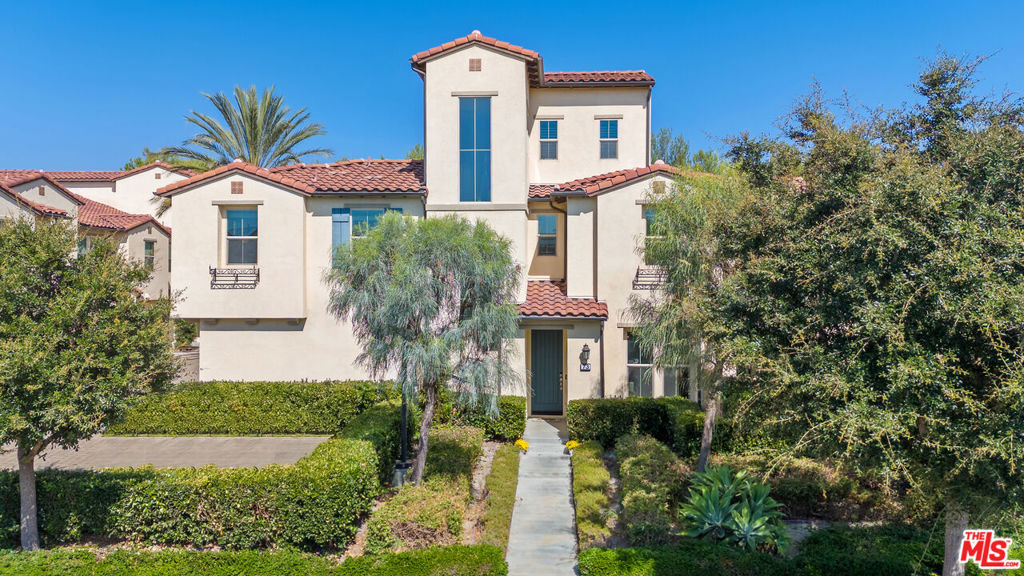 Welcome to your turnkey dream home in the luxurious Baker Ranch community of Lake Forest! This beautifully upgraded 3-bedroom, 2.5-bath, three-story residence features a versatile loft, open-concept living, and custom built-ins throughout. The chef's kitchen impresses with quartz counters, a marble backsplash, an oversized island, and premium stainless appliances. Downstairs offers built-in speakers and updated trim work, while the garage is finished with epoxy flooring and a dedicated EV charging outlet. Upstairs, the primary suite boasts a spa-like bath with dual sinks and a generous walk-in closet, complemented by a cozy landing with built-in shelving and a decorative fireplace. Additional upgrades include upstairs laundry with sink and cabinetry, plantation shutters, ceiling fans in every room, and enhanced sound-dampening insulation in the walls for added comfort and privacy. Life in Baker Ranch means award-winning resort-style amenities right outside your door. Residents enjoy three recreation centers The Grove (featuring a Clubhouse), The Arbors, and the Vista Swim Club (featuring outdoor kitchen) each with sparkling pools and spas, along with multiple parks, tennis and pickleball courts, basketball and volleyball, dog parks, playgrounds, and miles of scenic trails with open space and foothill views. With top-rated schools, low HOA dues, no Mello-Roos, and easy access to shopping, dining, and freeways, this home offers a rare combination of luxury and convenience. Turnkey, elevated, and designed for both everyday ease and entertaining, this home is ready for you to move in and start living the Baker Ranch lifestyle today.