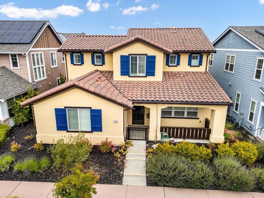Welcome to this beautifully upgraded model home in the sought-after neighborhood of East Garrison. First time on the market since being built, no expense was spared with the upgrades throughout this single family home such as plantation shutters, high ceilings, custom 8 doors, recessed lighting, and Burbur carpet. The formal dining room features a built-in display niche with recessed lighting, an ornate chandelier, and built-in speakers, comfortably fitting an 810 seat table. The open-concept kitchen offers granite countertops, a large island, tile backsplash, stainless steel KitchenAid appliances, ample cabinetry, and space for both informal dining and counter seating. The spacious living room boasts soaring ceilings, a masonry stone gas fireplace, built-in speakers, and a three-panel sliding glass door to the backyard. The first-floor primary suite includes private yard access, spa-like ensuite with dual sinks, his-and-her closets, soaking tub, and stone shower with bench. Upstairs hallway overlooks the living area and includes extra storage. Enjoy the stamped concrete patio, pergola, and finished garage with rear access and storage. Close to Cordell Hull Park, CSU Monterey Bay, the beautiful oceanside.