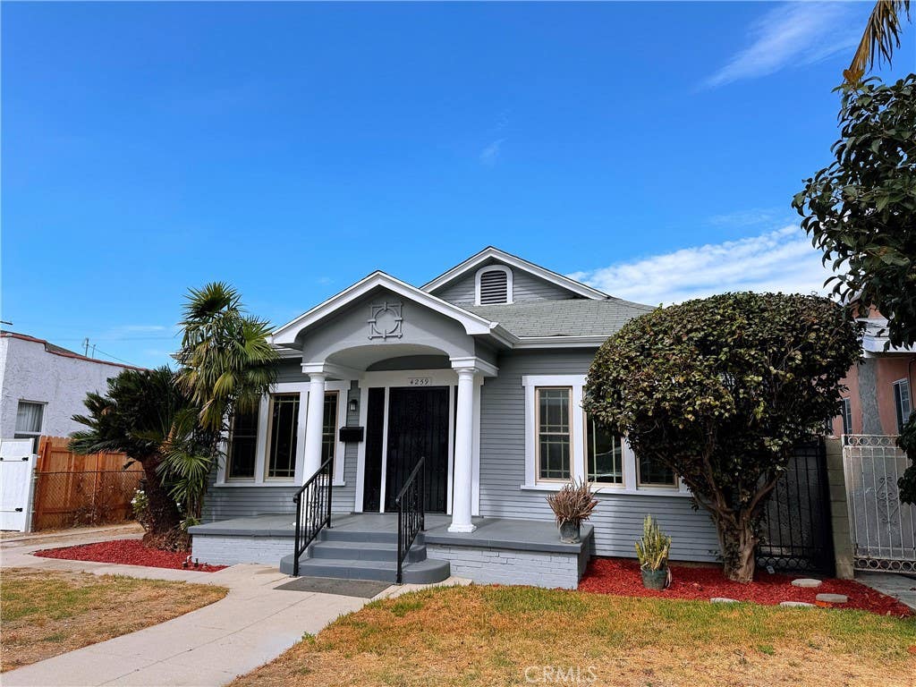 Photo of 4259 Walton Avenue, Los Angeles, CA 90037 (MLS # OC26124617)