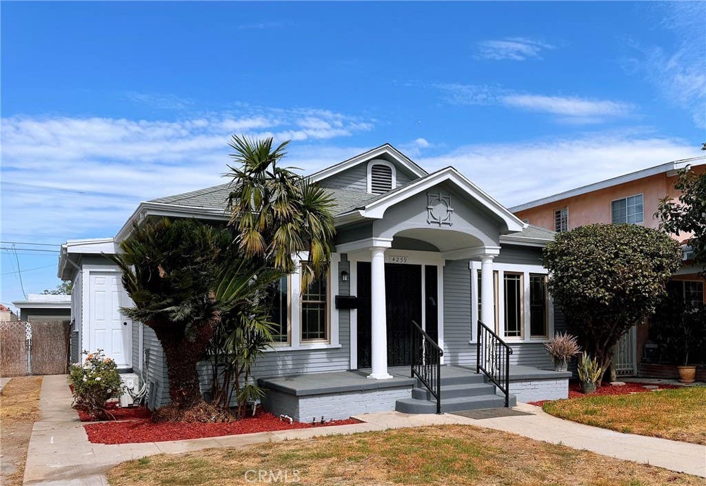 Photo of 4259 Walton Avenue, Los Angeles, CA 90037 (MLS # OC26124617)
