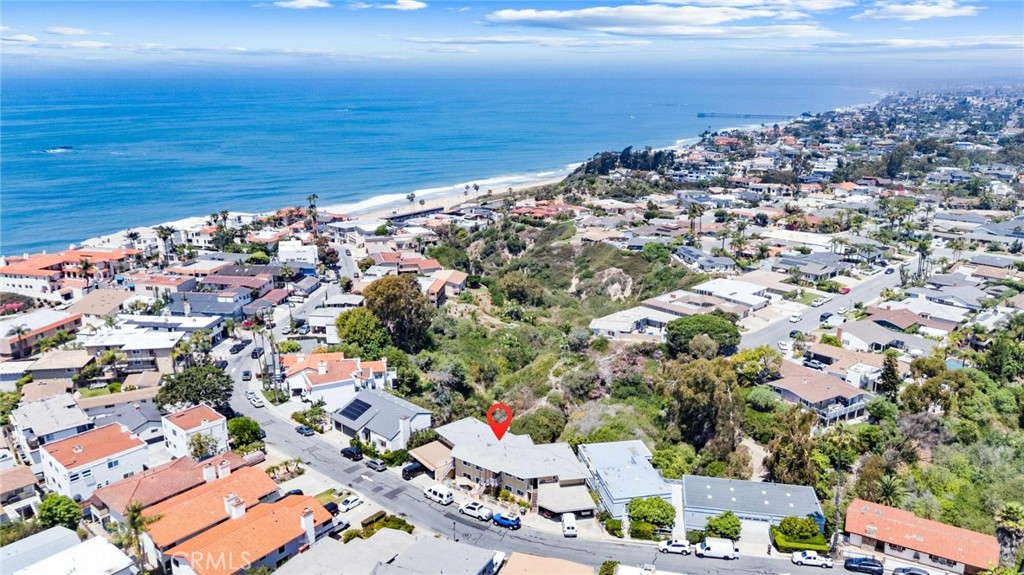 230 Avenida Montalvo is a rare investment opportunity in San Clemente’s highly sought-after “Loop” neighborhood. This blufftop 6-unit multifamily property offers breathtaking, unobstructed ocean views from every unit. Built in 1964 and family-owned for over 40 years, this extremely well-maintained asset presents a unique blend of pride of ownership and incredible upside potential, with approximately 45% in rental upside.
Each of the six spacious units features two bedrooms and two bathrooms, private balconies or patios, and stunning ocean views that enhance everyday living. Residents enjoy carport and driveway parking, while recent capital improvements—including new roofs, electrical systems, plumbing, dual-pane windows & sliders, reconstructed balconies, wood siding and insulation — ensure long-term stability and minimal maintenance needs.
Situated in a designated Short-Term Rental Zone, this property is ideal for investors looking to capitalize on both long-term and vacation rental demand. Just a short walk to San Clemente State Beach, Califia Park, and the scenic Bluff Trail, it offers an unbeatable coastal lifestyle that attracts consistent tenant interest. Don’t miss this exceptional opportunity to own a turnkey coastal asset with significant income growth potential in one of Southern California’s premier beach communities.
