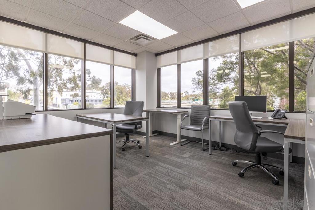 Discover an exceptional office rental opportunity in the heart of Downtown San Diego! INDIVIDUAL, PRIVATE PROFESSIONAL OFFICES FOR RENT within a fully functioning and all inclusive office suite. This 1,700-sqft suite offers 8 individual offices, each for rent separately, with a professional and fully equipped environment ideal for businesses seeking a prestigious address with convenience and comfort. Amenities included in rent: Front desk receptionist to greet visitors and accept packages during specific hours, high-speed internet broadband, gas and electricity utilities, business mailing address, nightly janitorial service, access to community lunchroom, professional scanning and printing equipment (limited monthly photocopies), and document shredding services. This office is ideal for any professional services, legal teams, startups, or any businesses seeking a modern, move-in-ready space in a central and vibrant location downtown. Schedule a tour today and secure your spot in one of San Diego’s most sought-after commercial hubs! Suite 325-4 is a CORNER office adorned with esterior windows that span the space, sized 12' x 14' for an approximately 161-square foot, locked off, private room that only you can access or use. It also includes access to the remaining 700+ square feet of community, reception, and printing space within the shared suite area. along with access to all building amenities. The only item not included in rent is optional parking, which costs $180/month/space in a secured, non-reserved garage attached to the building. Exceptional Office Space in the Heart of Downtown San Diego – 1,700 Sq. Ft. total space, 8 individual offices | Individual Offices for Rent in a Suite! Position your business for success with a beautifully maintained and fully functional office suite located in the vibrant core of Downtown San Diego's Cortez Hill. Designed for productivity, professionalism, and comfort, this space is ideal for companies looking to establish themselves in a prestigious and well-connected business district. The suite features eight private, individual offices available and a welcoming front desk/reception area, creating an ideal layout for teams of professionals, legal practices, startups, and client-facing businesses. Whether you're expanding or seeking a high-quality satellite location, this suite offers all the essentials for a seamless move-in experience. Included Amenities: Front reception desk attendant Internet, gas, and electricity utilities included—fewer bills to manage Mailing address for business use, adding credibility to your operations Nightly janitorial service for a consistently clean and professional space Modern lunchroom that’s pristine, inviting, and perfect for breaks or informal team gatherings Access to scanning equipment Limited monthly photocopies to support daily operations Secure document shredding services for confidential disposal Parking for an additional $180 per month per space Select offices feature stunning views of Downtown San Diego and the southern tip of Balboa Park, creating an inspiring workspace for you and your team. Whether you're meeting with clients, collaborating with colleagues, or focusing on solo work, this office offers the infrastructure and environment to support your growth. Don’t miss the opportunity to work in one of San Diego’s most sought-after commercial hubs. Schedule your tour today and take the next step for your business.
