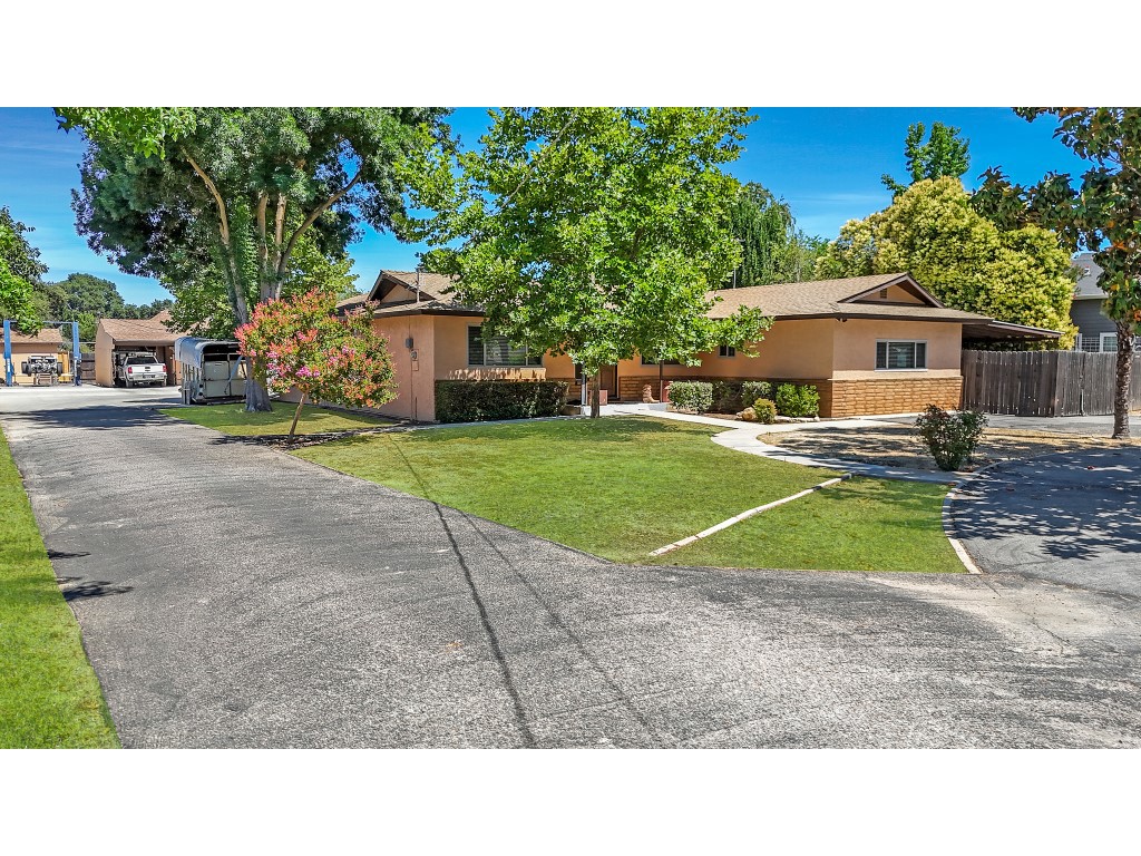 Don't miss this rare opportunity in Atascadero! This move-in-ready home sits on a spacious lot and includes a 1,600 sq ft shop-perfect for hobbyists, car enthusiasts, or those seeking an ADU conversion. The shop features its own electric meter, three-phase power, one of two septic tanks, room for three vehicles, a half-bathroom, and a large bonus room ideal for an office or creative studio. Also included are a 10x10 storage shed and a car lift near the shop. Enjoy a half basketball court for daily exercise or fun with family and friends. Inside the main home, two separate family areas offer flexibility for entertaining, relaxing, or working from home. The layout supports multi-functional living with endless potential. Whether you need space, storage, or future rental income, this property has it all. Schedule your private showing today and discover everything this incredible home has to offer!