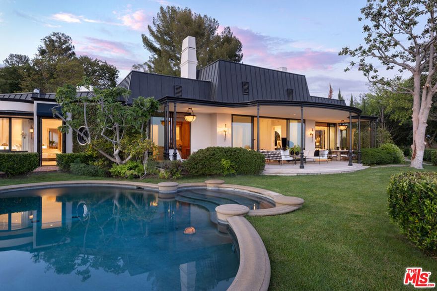 Paul and Jean Trousdale Residence, John Elgin Woolf - 1958. World-class on every level, this jewel box is a hallmark of Hollywood Regency design. Sited on 3/4 acre promontory offering complete privacy behind double gates. Jetliner panoramic views from Downtown to the Pacific Ocean. Designed for the most sophisticated of tastes, a legendary couples house built for entertaining on a grand scale. Timeless in every way.