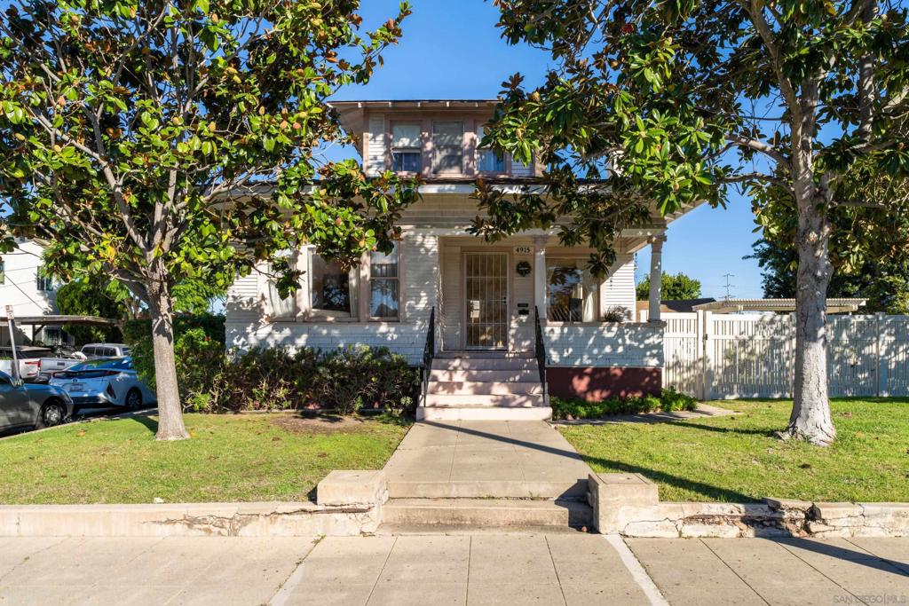 Timeless San Diego Charm on a Spacious Corner Lot Ideally situated on a prime corner lot in one of San Diego’s most sought-after neighborhoods, 4915 Uvada Place blends timeless character with everyday livability. Built in 1915, this inviting home features 3 bedrooms, 1 bath, and a spacious .17-acre lot that offers room to grow. From the welcoming front porch to the vintage design details, every space reflects classic charm and warmth. The unfinished basement offers versatile space for storage, a workshop, or future expansion, while the expansive outdoor area is ideal for entertaining, gardening, or adding an ADU. A detached three-car garage completes the property. Enjoy the best of historic San Diego living—a property that combines location, character, and opportunity just moments from local dining, shops, parks, and community favorites.