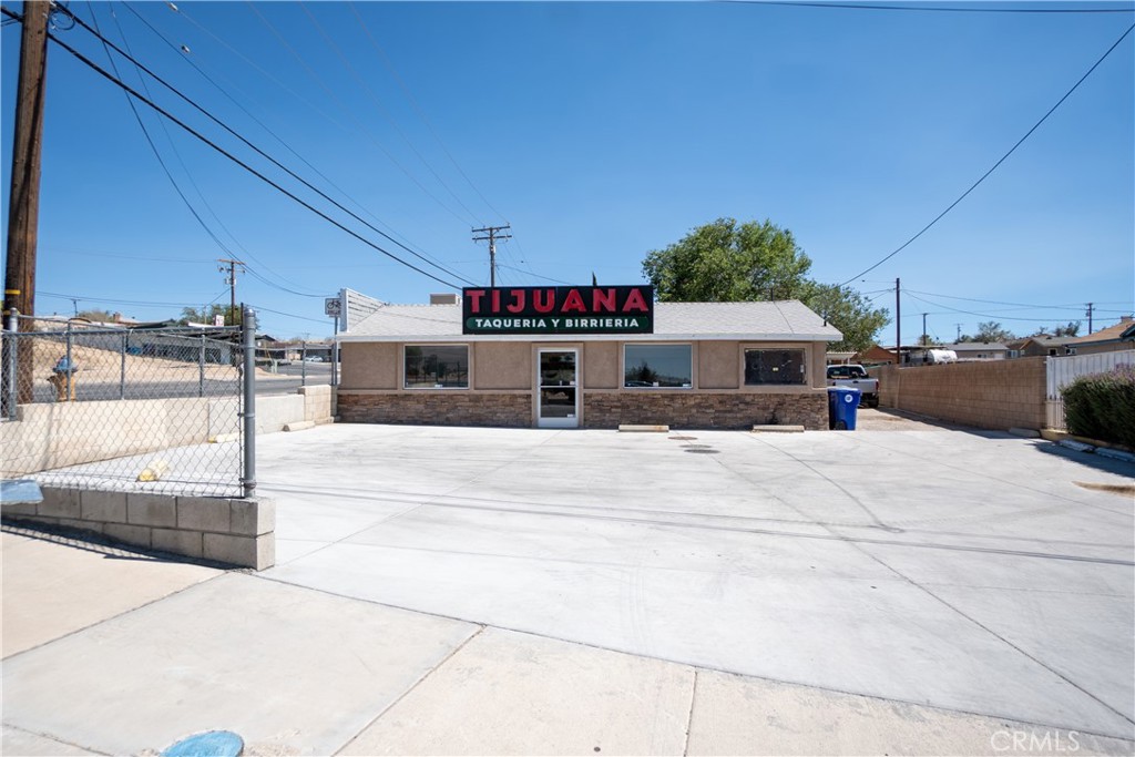New restaurant business opportunity. ±2,769 sqft. building, consisting of a restaurant space and an attached dwelling unit, for sale in the city of Victorville, CA. This newly renovated restaurant includes a fully built out kitchen with a walk-in cooler, hood exhaust system, as well as many pieces of equipment for the kitchen and dining area. This space also boasts a separate bar counter area shown in the pictures provided.
The dwelling unit consists of two bedrooms, one bathroom, kitchen area, living room/entrance space, bonus room and storage room with the water heater installed inside. Each space has their own main and rear entrances and while the restaurant has its own parking lot on the Hughs rd. side, the dwelling unit has a small driveway on its own side off of Hesperia rd. Perfect for an expanding business looking to own their new location or a new business owner interested in opening their own restaurant. Contact agent for showing availability!