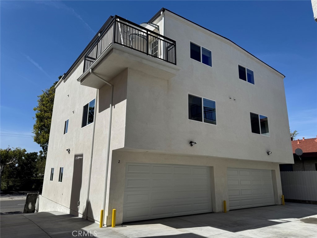 It offers a 4-bedroom, 4.5-bath, 2-car attached garage, individual laundry room, and solar panels to help you reduce your electric bill. This brand-new home had never been occupied before. Each bedroom features an en-suite bathroom, including a suite on the first floor. The open-concept kitchen boasts stainless steel appliances, flowing into a spacious family room and the master suite includes a walk-in closet and a balcony with breathtaking peak a boo view located on the 2nd floor. Two bedrooms with individual bathrooms and walk-in closets are on the 3rd floor. Waterproof hardwood flooring throughout adds elegance. Built with top-quality materials. A new refrigerator, washer, and dryer are included. This home is the perfect mix of comfort and style. Other units are leased, this is the last one left. This is a model match of unit 4 that is already leased, and some pictures are used from that unit.