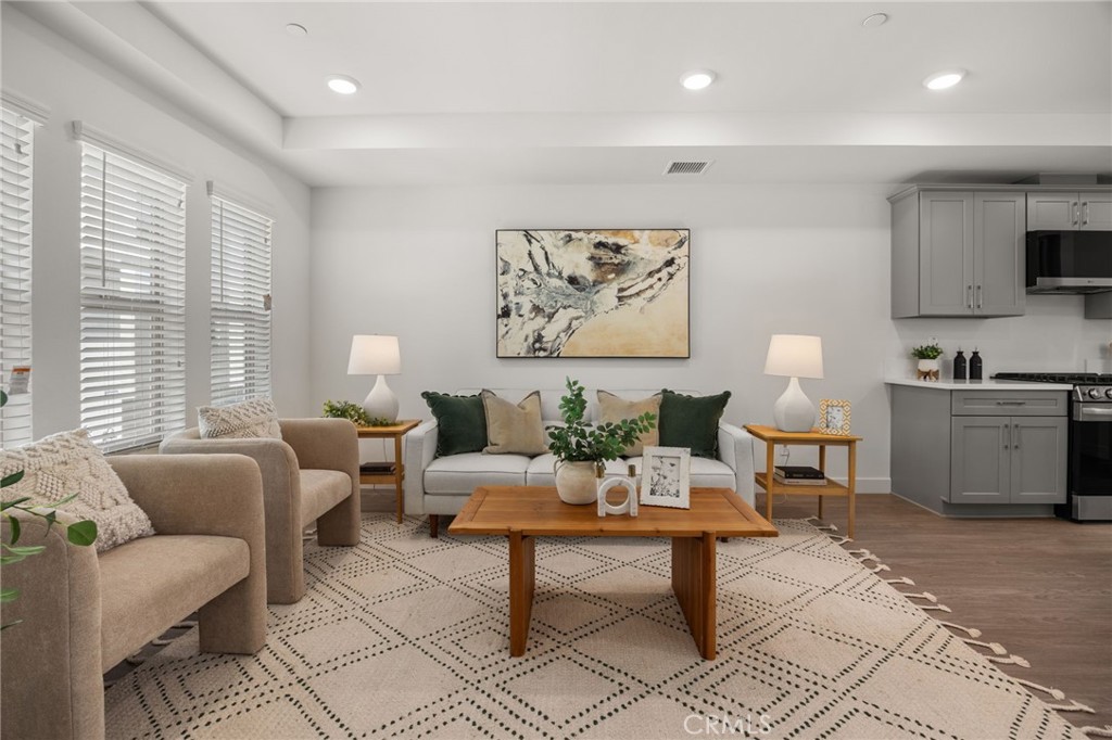 Heritage on First Apartments are conveniently located at the Northwest corner of 1st Street and White Avenue. The newly constructed apartment community is 1mile from the University of La Verne and a short walk to the La Verne Gold Line Station. The La Verne Gold Line will be operational by late Spring 2025 and once in service, a trip from La Verne to Pasadena will take approximately 31 minutes and approximately 60 minutes to downtown Los Angeles. The tri-level apartment units feature an open concept, attached 2-gar garage, stylish finishes, and all appliances, including gas range, microwave, refrigerator, washer, and dryer. The first level consists of the 2-car garage, foyer, and 1 bedroom and bathroom, while the second level features the kitchen, family room, dining area, 1 bedroom, and half bathroom. Finally, the third level contains the laundry room, two bedrooms and bathrooms, and a balcony overlooking the apartment community and surrounding amenities. The photos attached are the 3 bedroom, 3 bathroom floor plan. Available: July 1, 2025
