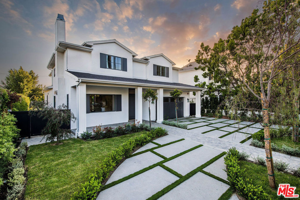 REDUCED! REDUCED! $100,000 below Appraisal. NEW CONSTRUCTION in prime area of Santa Monica (Gillette Regent Square). Your private sanctuary is gated with a circular driveway for multiple parking. Expansive floor plan features high ceilings in living room & formal dining, state of the art kitchen with high end appliances, massive island, butler's pantry, spacious family room overlooks beautiful landscape backyard with built in BBQ & outdoor bath. Sophistication and luxury is exemplified throughout. Downstairs living room with walk up bar, state-of-the-art media/theater, game room, wine storage plus a walk in refrigerated cellar, office with built ins, guest suite, two laundry rooms. Upstairs luxury master suite,terrace with tree top views, his and hers walk in closets, plus 3 bdrs, play area/study. Unparalleled craftsmanship and exceptional amenities: gorgeous European white oak plank flooring, marble and quartz counter tops, three handcrafted stone fireplaces. Ideal family home!