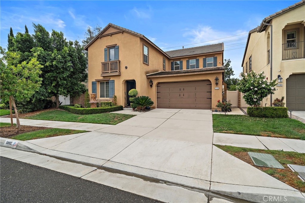 Discover a rare opportunity to own one of the most beautifully upgraded and best-priced homes per square foot in the prestigious Park Place community of Ontario Ranch. Perfectly positioned with no neighbors behind and tranquil tree-top views, this residence offers refined living and exceptional value in one of the Inland Empire’s fastest-growing luxury enclaves. Step inside to experience a spacious, light-filled design enhanced by wide-plank luxury flooring, elegant finishes, and thoughtful upgrades throughout. The chef’s kitchen is both functional and stunning—featuring an oversized island, rich dark cabinetry, high-end stainless appliances, and a custom backsplash that anchors the open-concept living area. The great room flows seamlessly into the dining space and out to a private outdoor retreat—complete with a covered patio, outdoor kitchen, river rock accents, and glowing string lights that make every evening feel special. The main-floor bedroom with private entrance and adjacent full bath offers flexibility for guests or multi-generational living. Upstairs, the primary suite feels like a five-star escape with a massive spa-like bathroom, dual vanities, soaking tub, walk-in shower, and a custom-built walk-in closet. The additional bedrooms are beautifully finished, while the oversized loft provides another full living area perfect for work, play, or relaxation. Additional highlights include solar panels for energy efficiency, a three-car garage, and access to resort-style amenities—a clubhouse with entertainment spaces, fitness center, pool, spa, tennis courts, and regular community gatherings that bring a sense of connection and ease. Conveniently located near major freeways, shopping, and top-rated schools, this home delivers the perfect blend of luxury, community, and long-term value. A turnkey opportunity of this caliber—offering such privacy, upgrades, and prestige—simply doesn’t come around often. Live beautifully, invest wisely, and feel at home instantly.