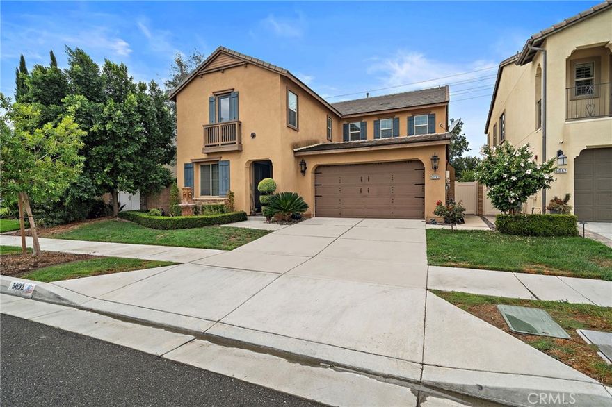 Discover a rare opportunity to own one of the most beautifully upgraded and best-priced homes per square foot in the prestigious Park Place community of Ontario Ranch. Perfectly positioned with no neighbors behind and tranquil tree-top views, this residence offers refined living and exceptional value in one of the Inland Empire’s fastest-growing luxury enclaves. Step inside to experience a spacious, light-filled design enhanced by wide-plank luxury flooring, elegant finishes, and thoughtful upgrades throughout. The chef’s kitchen is both functional and stunning—featuring an oversized island, rich dark cabinetry, high-end stainless appliances, and a custom backsplash that anchors the open-concept living area. The great room flows seamlessly into the dining space and out to a private outdoor retreat—complete with a covered patio, outdoor kitchen, river rock accents, and glowing string lights that make every evening feel special. The main-floor bedroom with private entrance and adjacent full bath offers flexibility for guests or multi-generational living. Upstairs, the primary suite feels like a five-star escape with a massive spa-like bathroom, dual vanities, soaking tub, walk-in shower, and a custom-built walk-in closet. The additional bedrooms are beautifully finished, while the oversized loft provides another full living area perfect for work, play, or relaxation. Additional highlights include solar panels for energy efficiency, a three-car garage, and access to resort-style amenities—a clubhouse with entertainment spaces, fitness center, pool, spa, tennis courts, and regular community gatherings that bring a sense of connection and ease. Conveniently located near major freeways, shopping, and top-rated schools, this home delivers the perfect blend of luxury, community, and long-term value. A turnkey opportunity of this caliber—offering such privacy, upgrades, and prestige—simply doesn’t come around often. Live beautifully, invest wisely, and feel at home instantly.